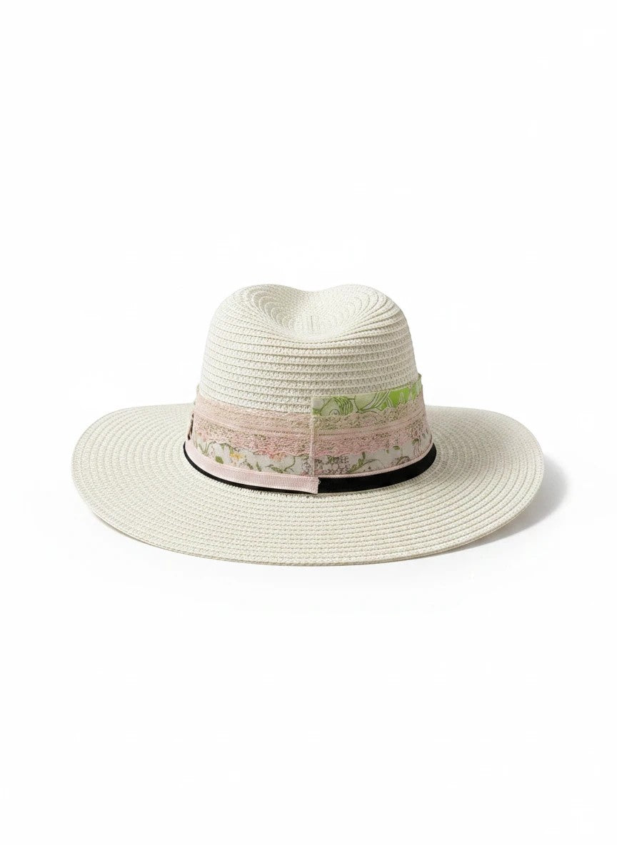 Adams + Hegwood off-white straw fedora with a layered floral ribbon, lace trim, and pearl-accented bow.