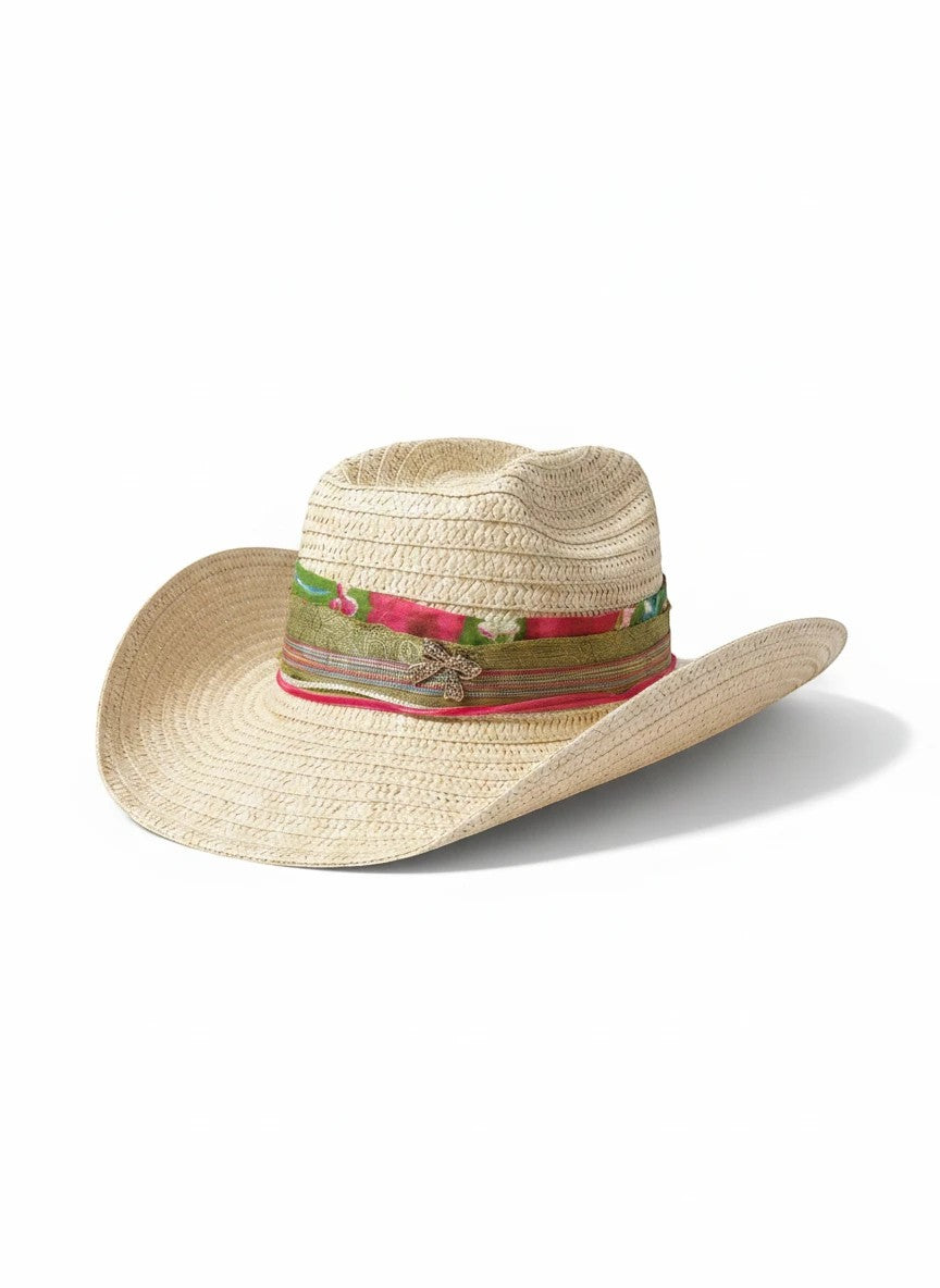 Adams + Hegwood woven straw western hat with a colorful floral fabric band and decorative charm on a white background.
