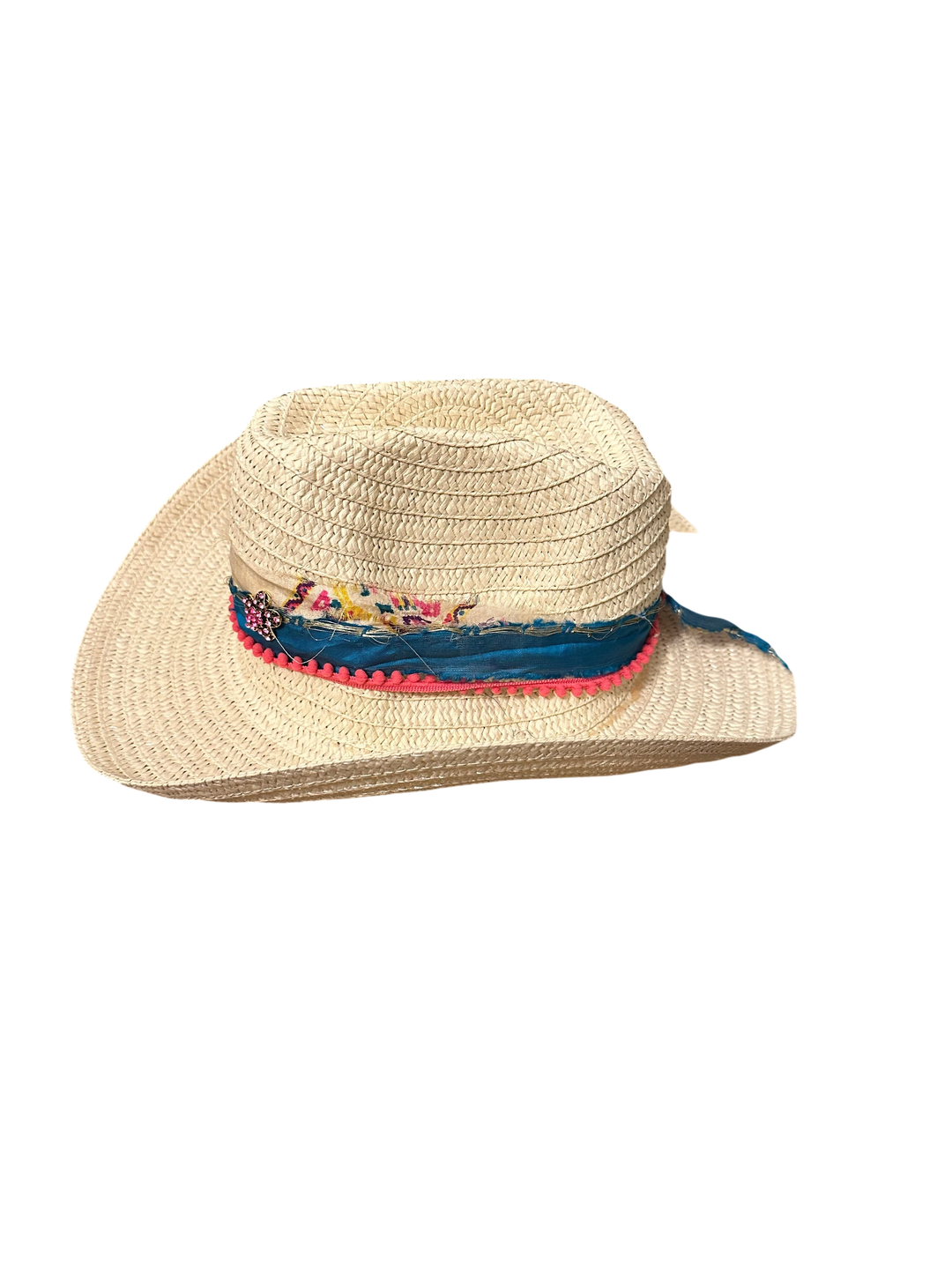 Adams + Hegwood woven straw Western hat with a blue fabric band, pink pom-pom trim, and floral embellishment.
