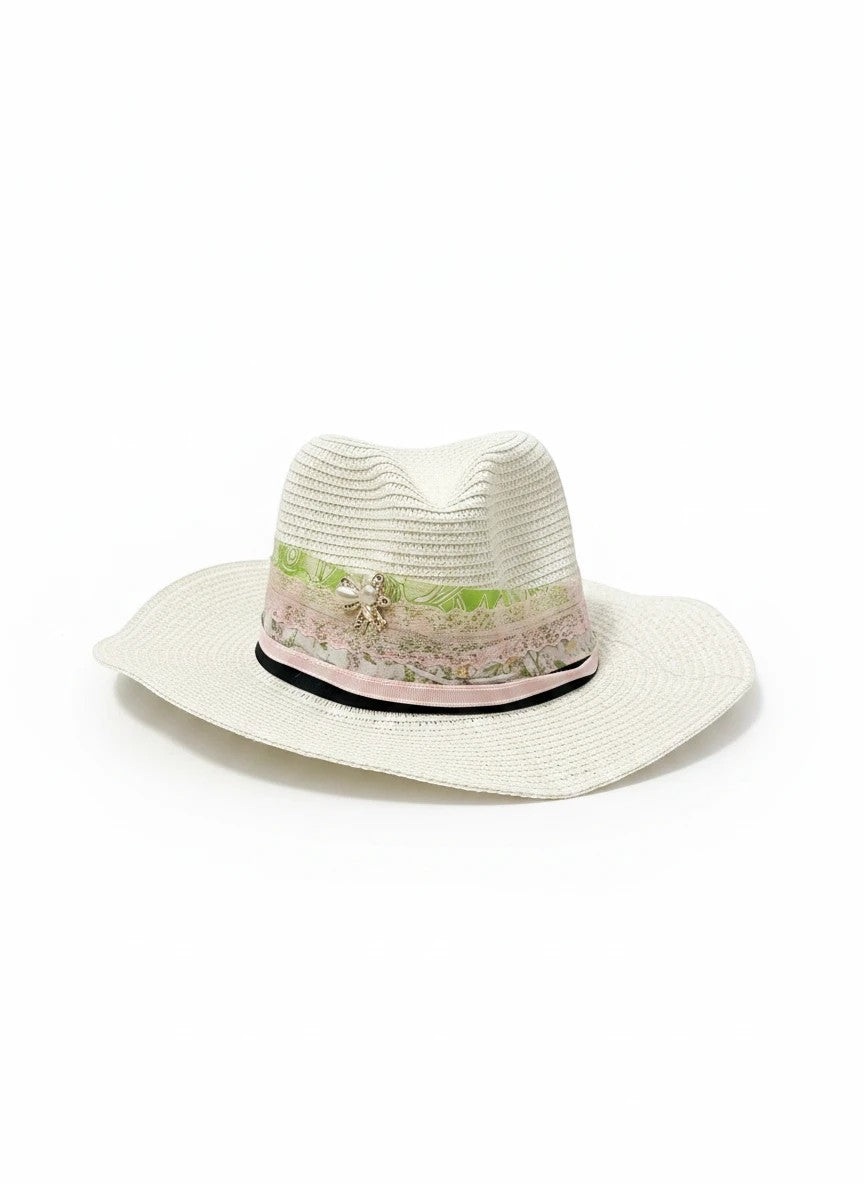 Adams + Hegwood off-white straw fedora with a layered floral ribbon, lace band, and pearl-accented bow detail.