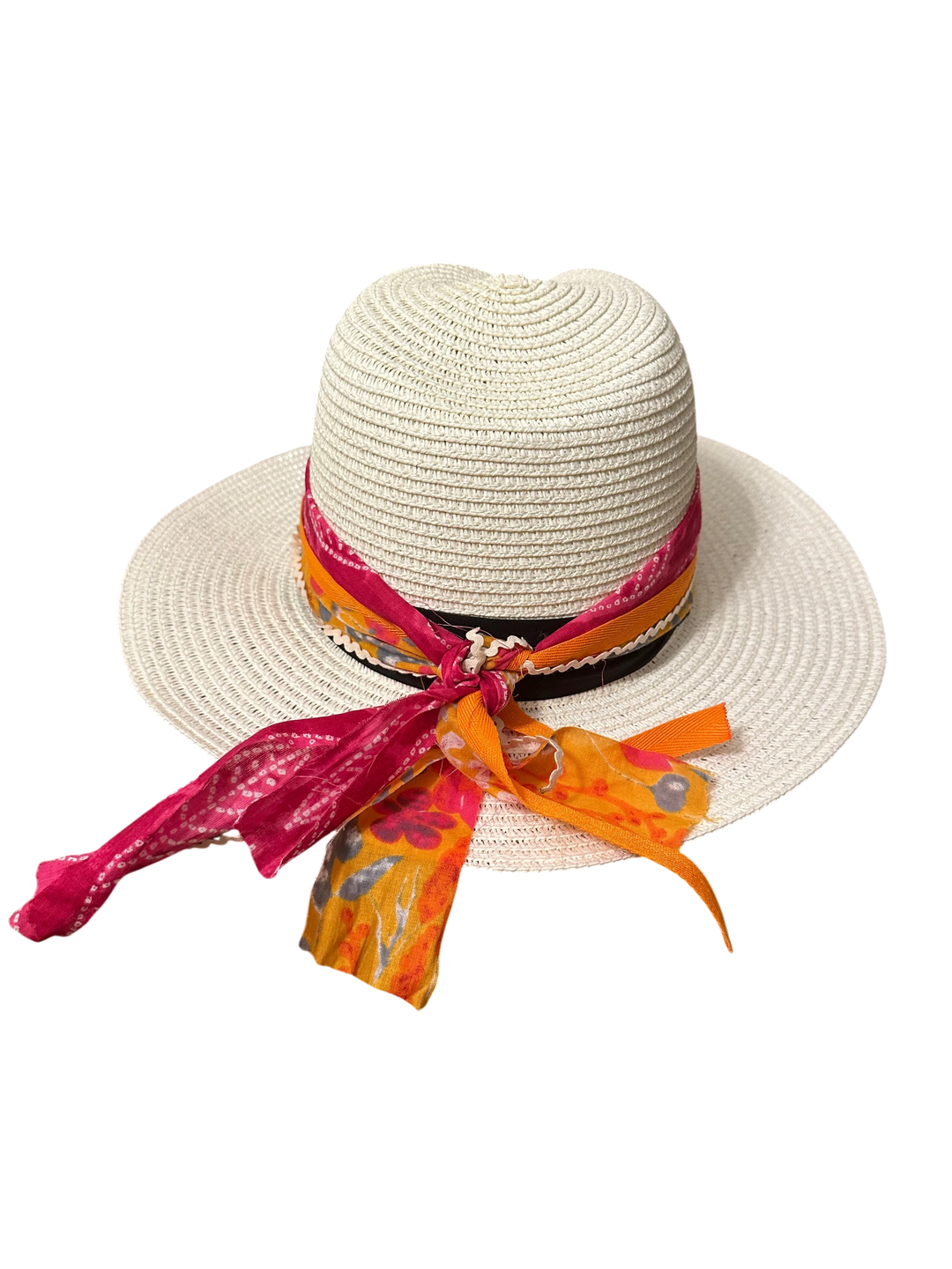 Adams + Hegwood cream straw sun hat featuring a vibrant pink and orange floral patterned scarf tied around the crown.