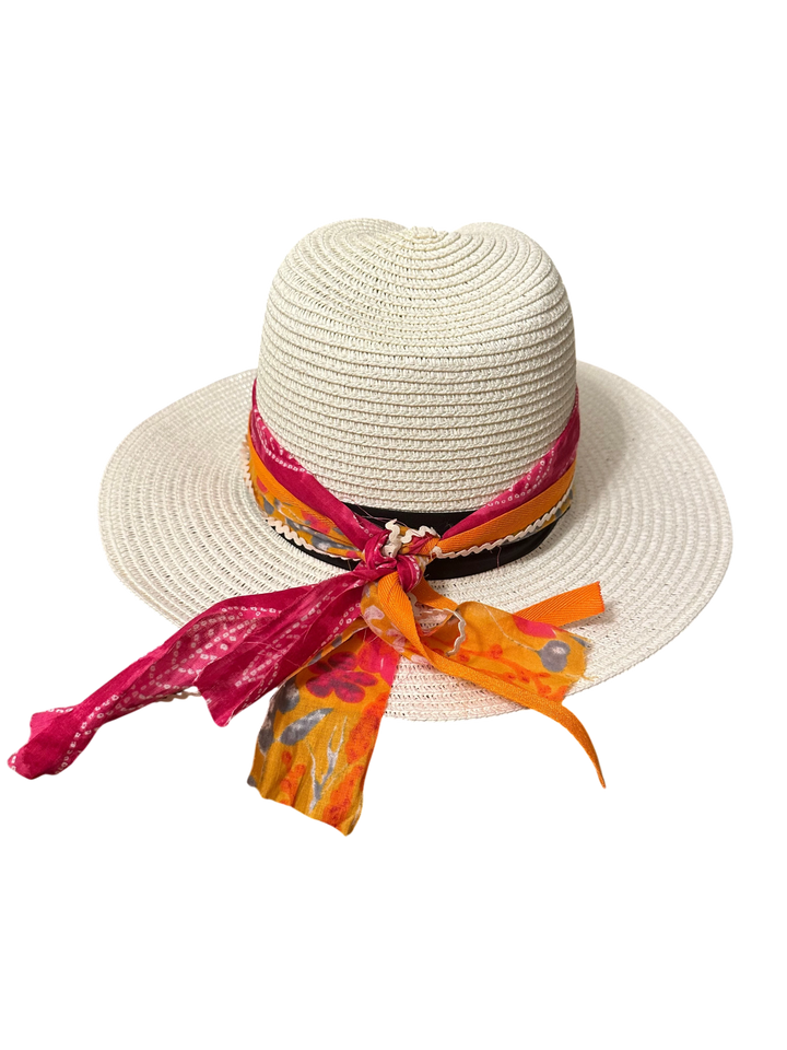 Adams + Hegwood cream straw sun hat featuring a vibrant pink and orange floral patterned scarf tied around the crown.