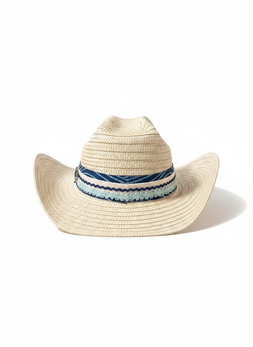 Adams + Hegwood woven straw western sun hat with a blue patterned fabric band and crochet trim on a white background.