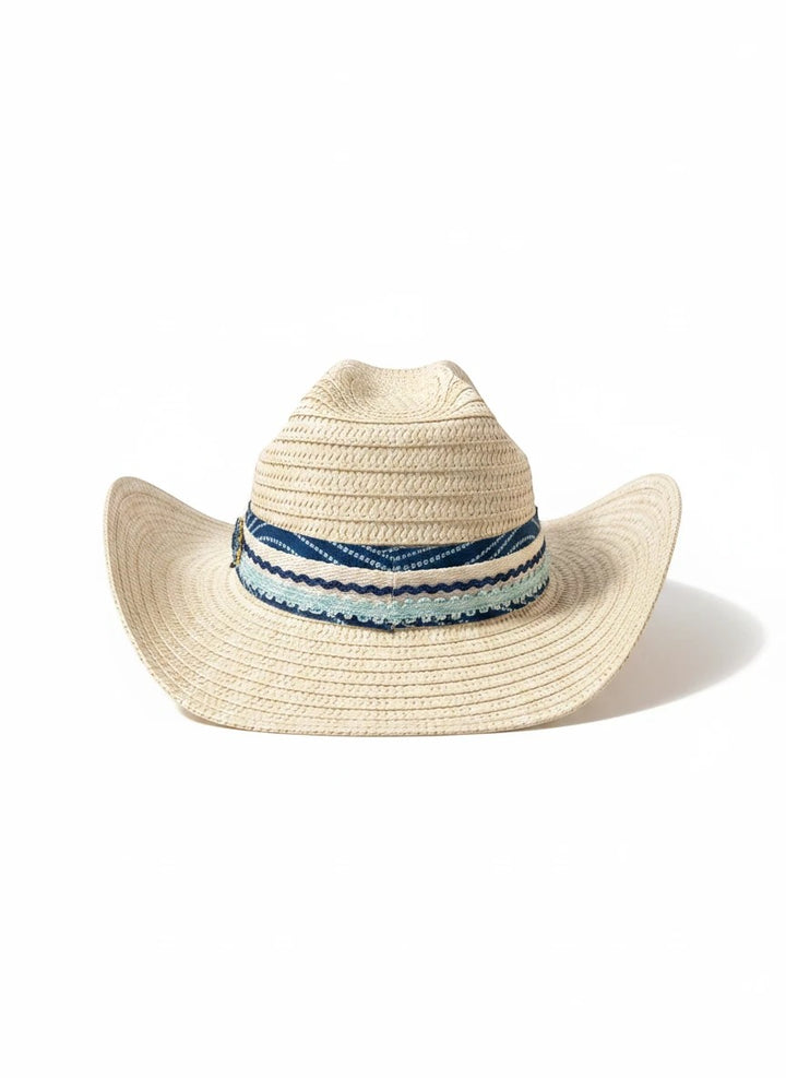 Adams + Hegwood woven straw western sun hat with a blue patterned fabric band and crochet trim on a white background.