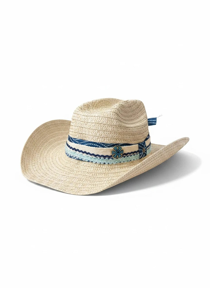 Adams + Hegwood woven straw western sun hat with a blue patterned fabric band, crochet trim, and floral accent.
