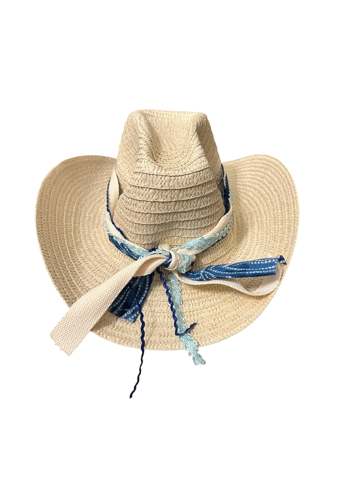 Adams + Hegwood woven straw western sun hat with a blue patterned fabric band and decorative crochet trim.