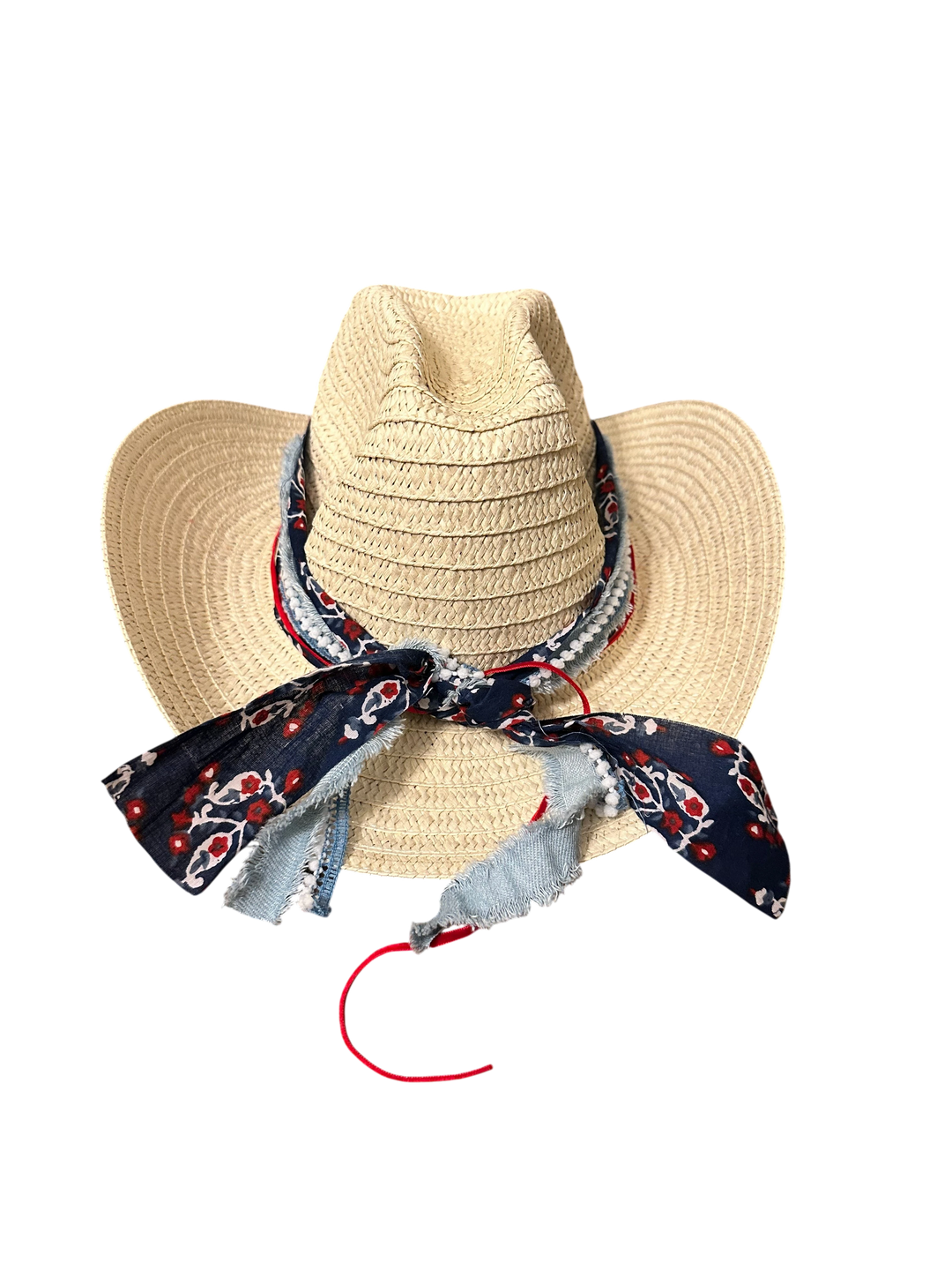 Adams + Hegwood woven straw western hat with a floral denim band, frayed edges, and red trim on a black background.