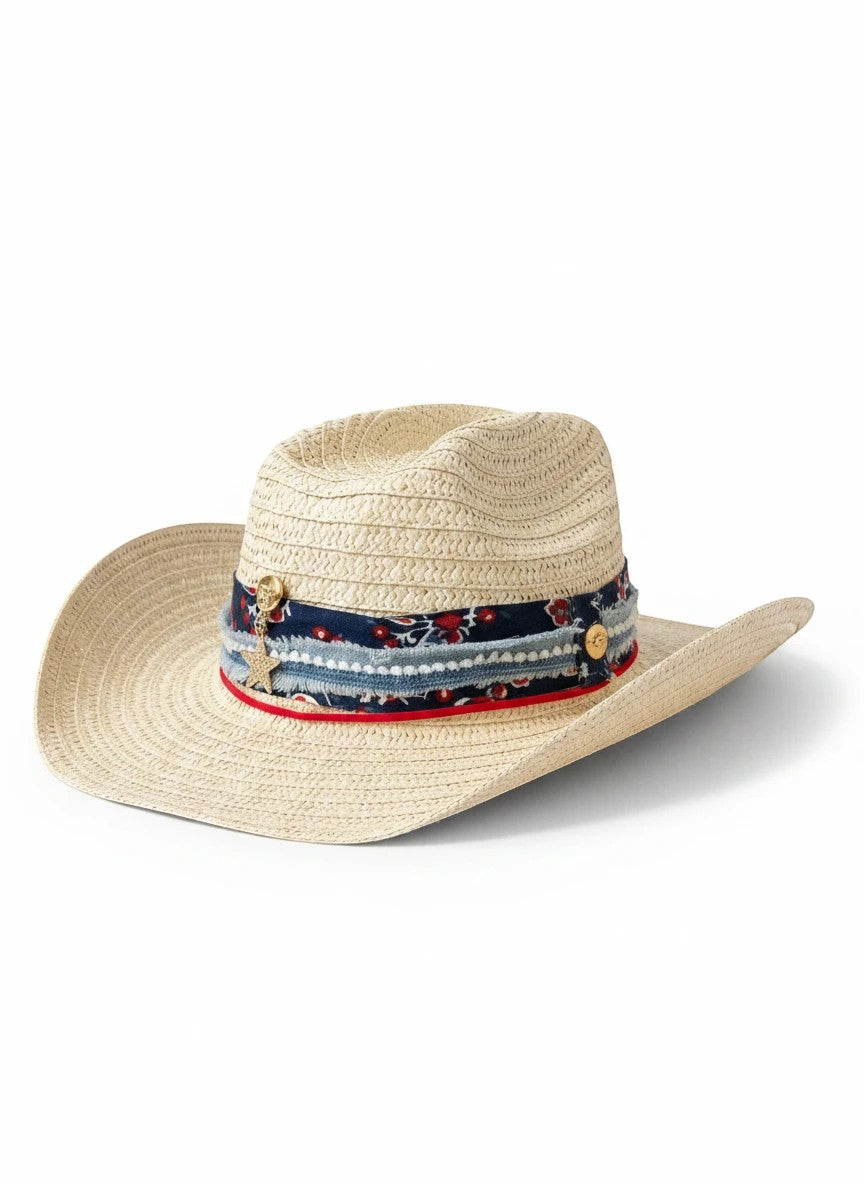 Adams + Hegwood woven straw western hat with a floral print band, frayed denim texture, and metallic star charm.