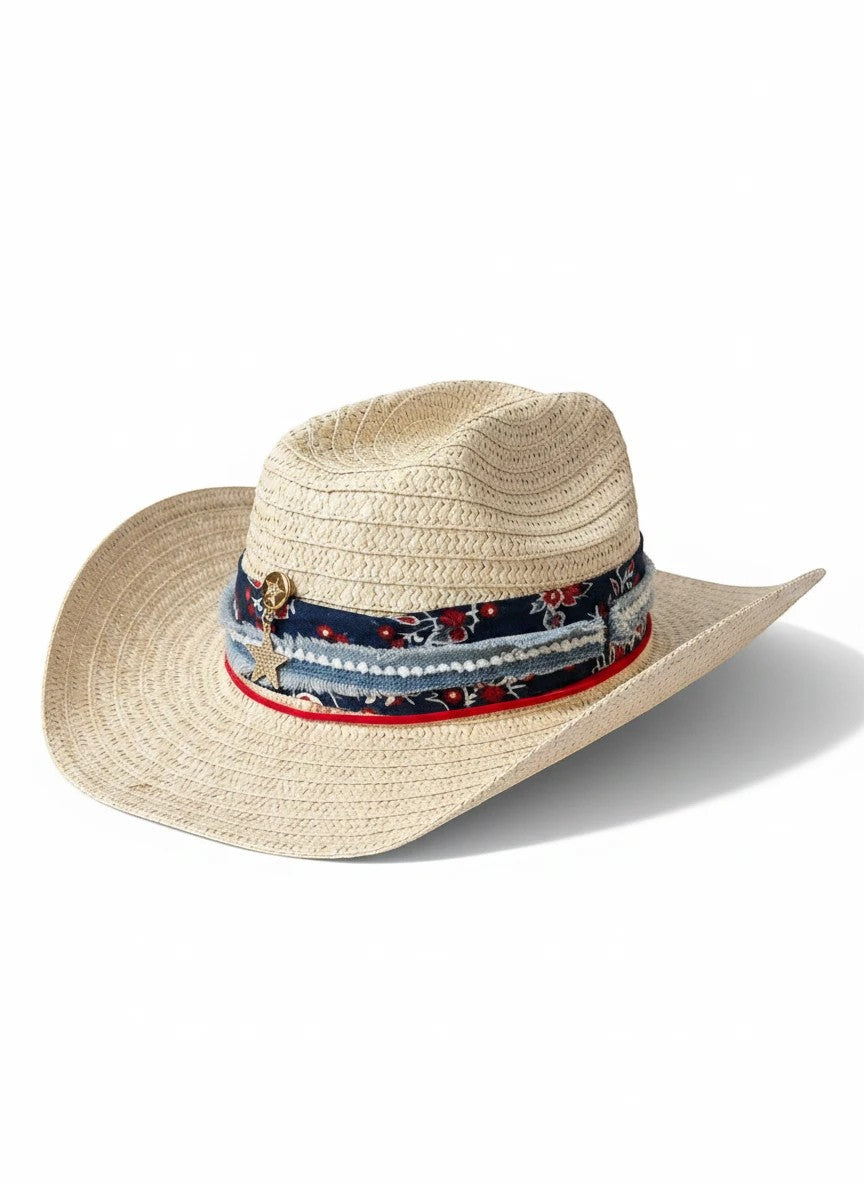 Adams + Hegwood woven straw western hat with a floral print band, frayed denim texture, and metallic star charm.
