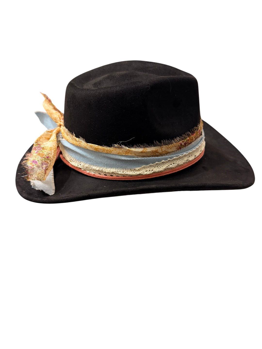 Natalie Adams Hegwood Studio black suede hat with decorative frayed fabric and lace ribbon ties on a white background