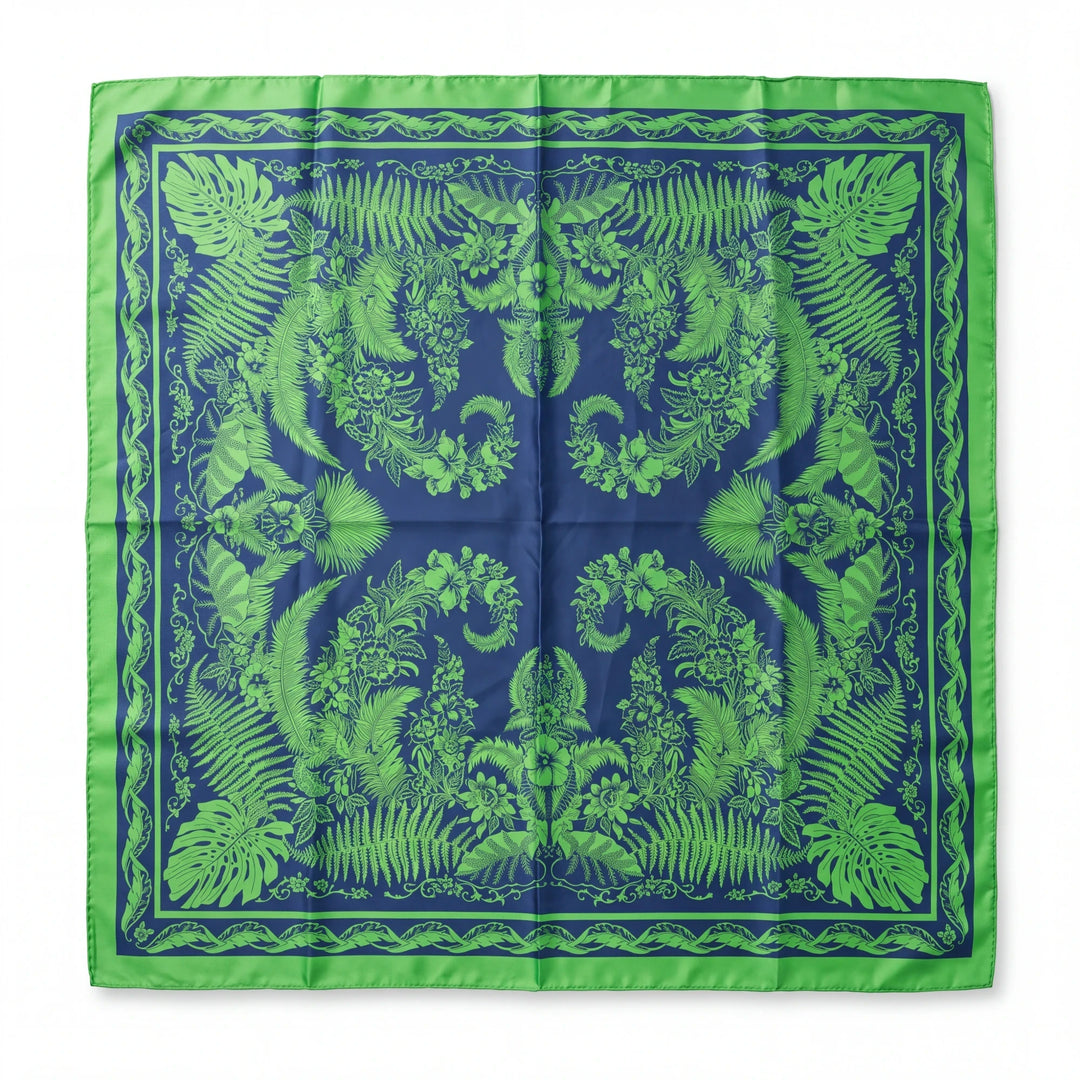 Natalie Adams Hegwood Studio square silk scarf in navy blue and lime green with a tropical fern and floral print.