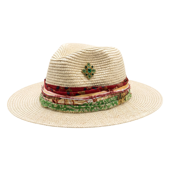 Natalie Adams Hegwood Studio straw fedora with a vibrant multi-layered fabric band and a green jewel embellishment.