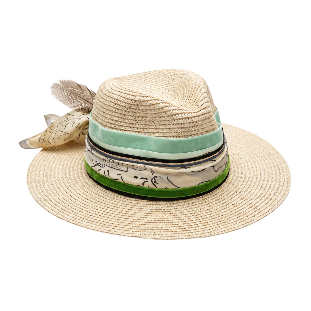 Natalie Adams Hegwood Studio wide brim straw fedora with green ribbon, patterned scarf tie, and feather accent.