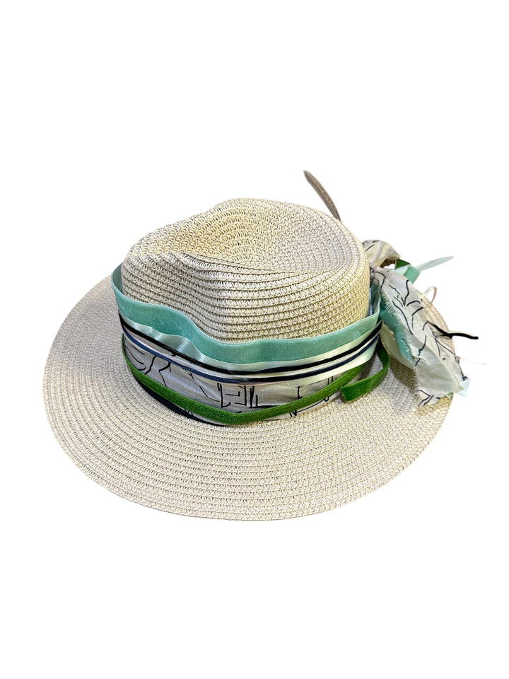 Natalie Adams Hegwood Studio wide brim straw fedora with green and cream ribbon band, scarf tie, and feather accent.