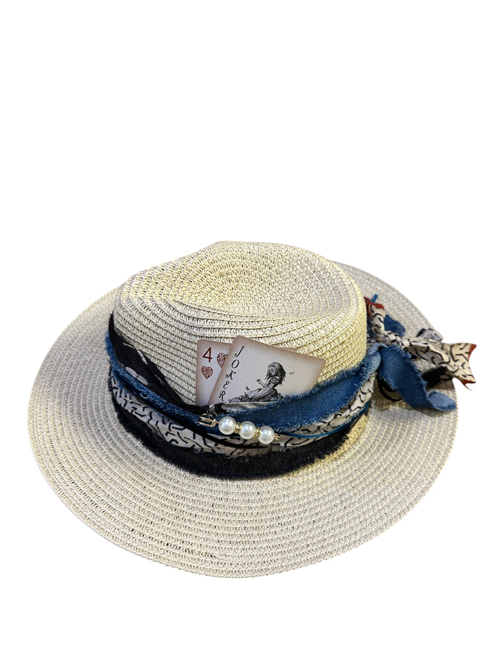 Natalie Adams Hegwood Studio woven straw fedora with layered denim, patterned fabric trim, pearl accents, and joker card.