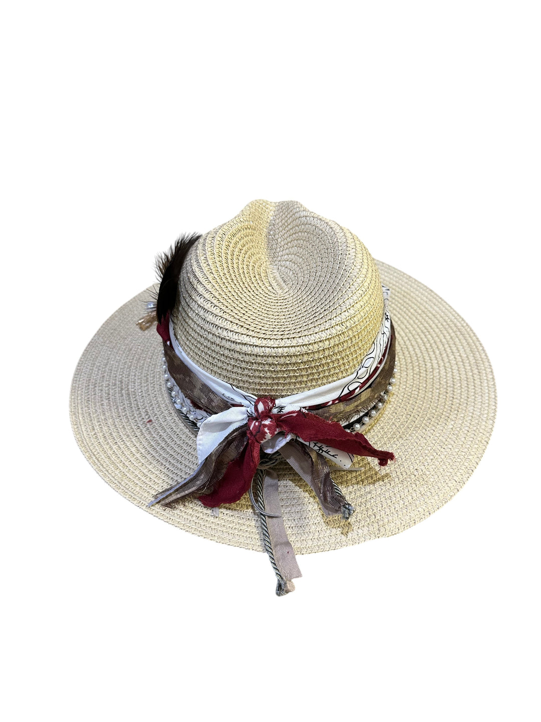 Natalie Adams Hegwood Studio straw fedora with a decorative band featuring layered fabric, pearl accents, and a feather.