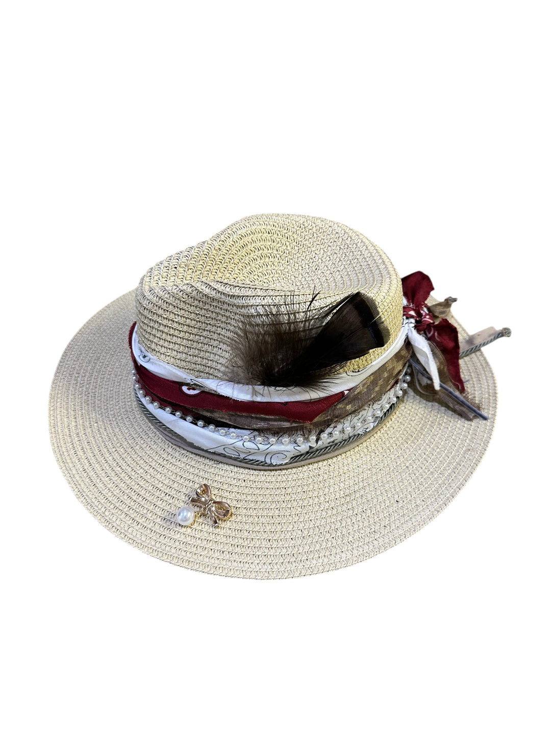 Natalie Adams Hegwood Studio straw fedora with decorative layered fabric band, pearl accents, and feather detail.