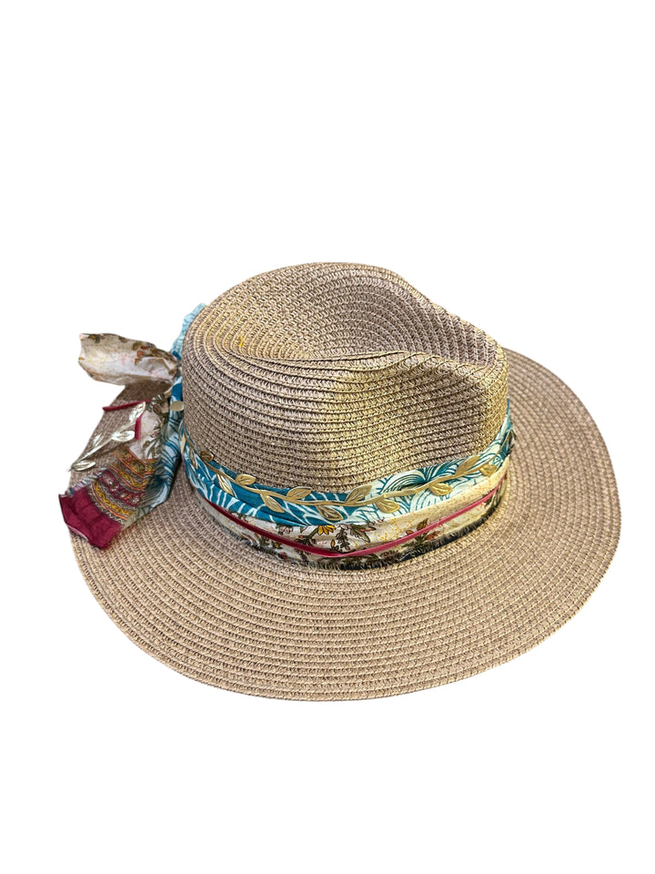 Natalie Adams Hegwood Studio woven straw fedora with a multi-colored patterned fabric band and side tie detail.