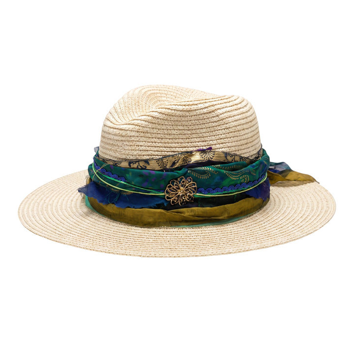 Natalie Adams Hegwood Studio wide brim straw fedora with a layered blue and green fabric band and floral brooch.