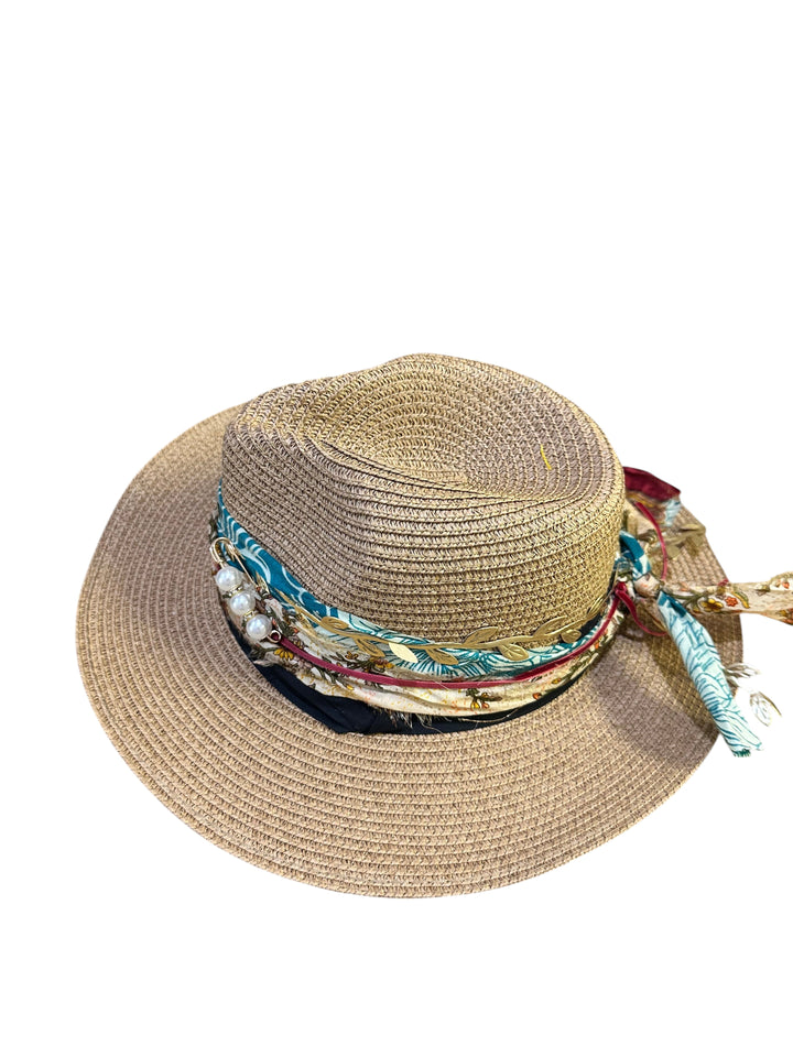 Natalie Adams Hegwood Studio woven straw fedora with a multi-colored fabric band, leaf patterns, and pearl accents.