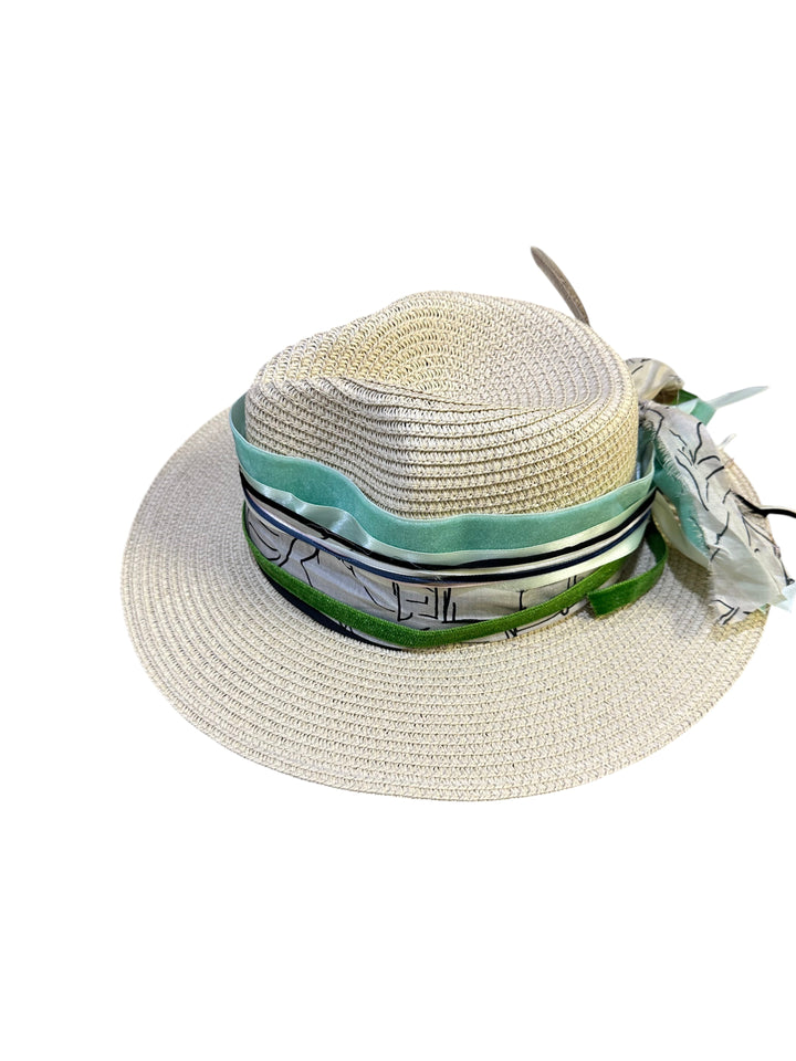 Natalie Adams Hegwood Studio wide brim straw fedora with a green and cream ribbon band, scarf tie, and feather accent.