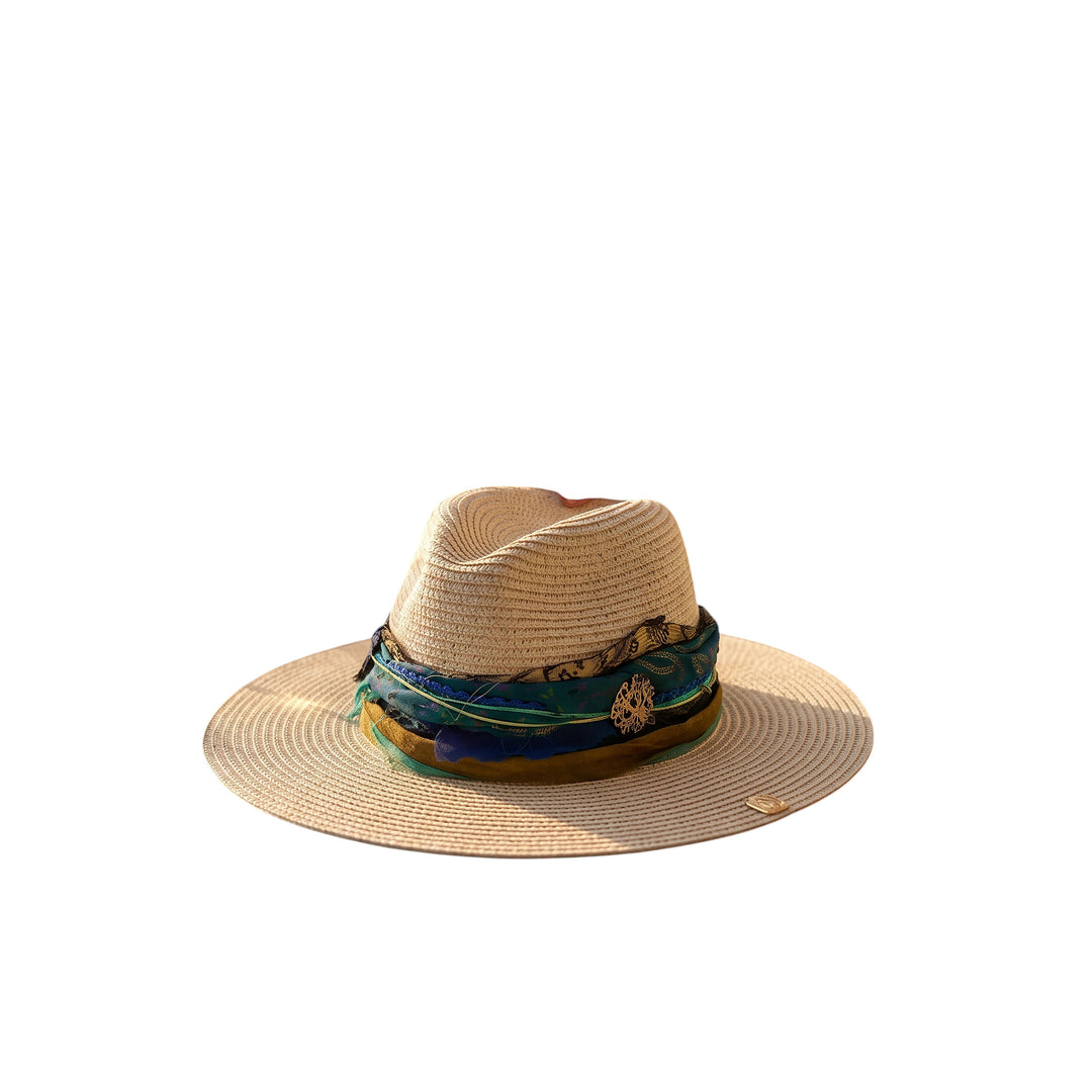 Natalie Adams Hegwood Studio wide brim straw fedora with a layered blue and green fabric band and gold accent