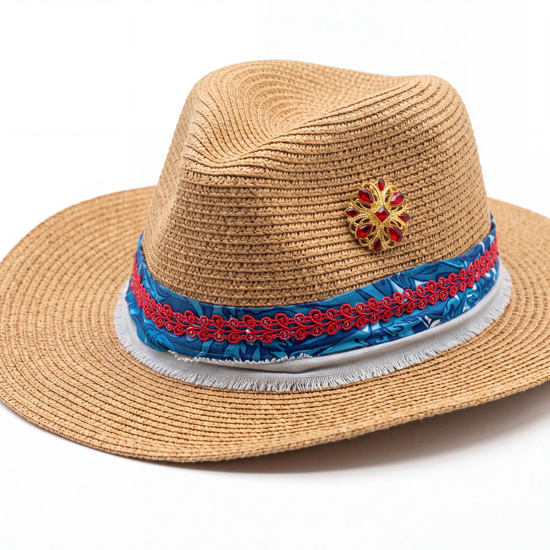 Natalie Adams Hegwood Studio caramel straw fedora with blue paisley, frayed denim, red braid, and gold ruby brooch.