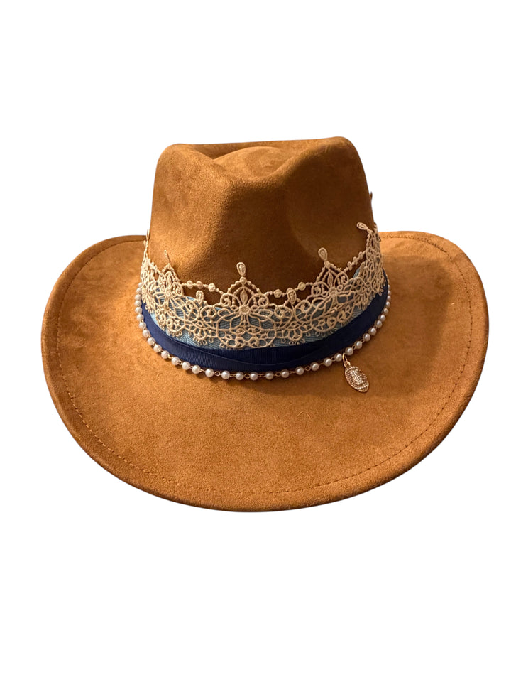 Natalie Adams Hegwood Studio tan suede cowgirl hat with gold lace crown, navy ribbon, pearl trim, and rhinestone charm
